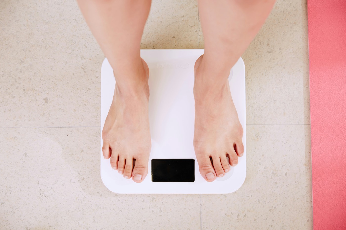 Weight scale showing successful weight loss results